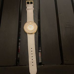 Swarovski gold and white watch